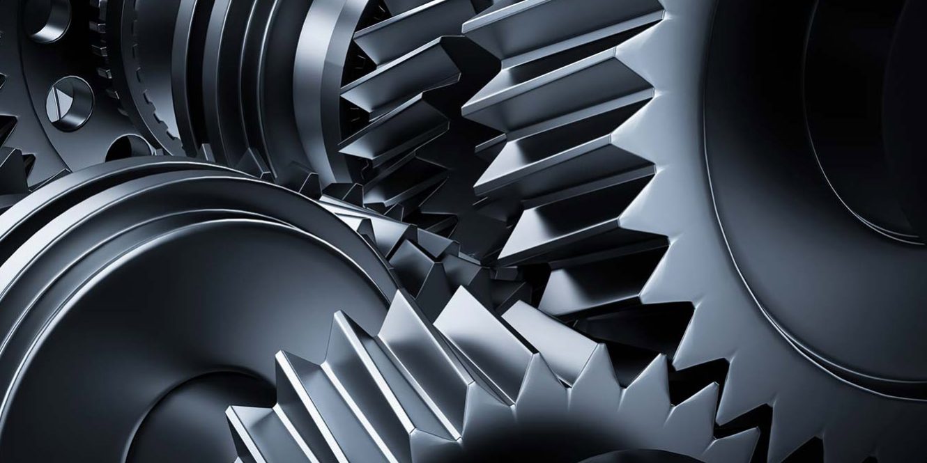 Motor, engine close-up. Gears, cogwheels, real engine elements Piano di Commissioning Impianti Industriali