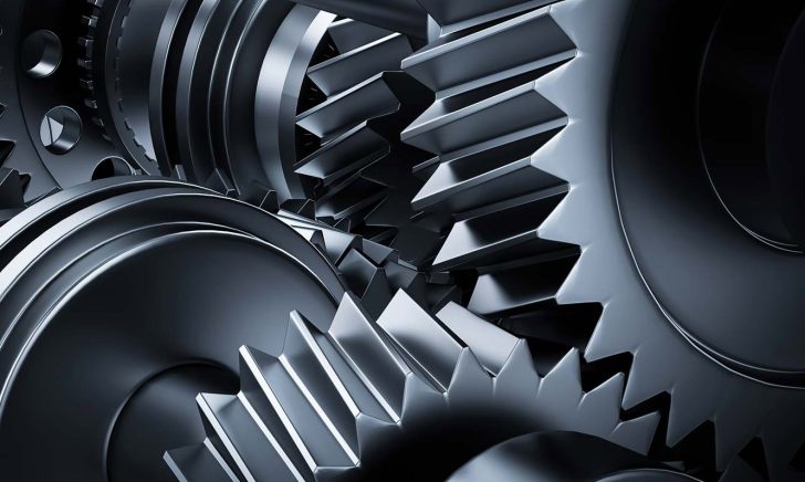 Motor, engine close-up. Gears, cogwheels, real engine elements Piano di Commissioning Impianti Industriali